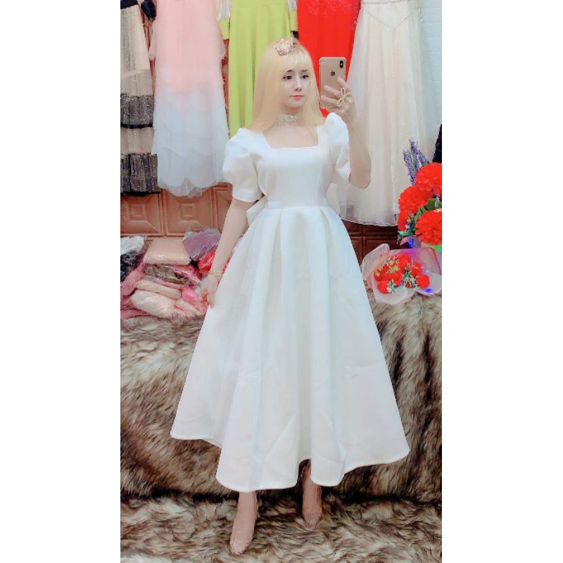 Đầm xòe công chúa tay phồng nơ to sau lưng anh thât