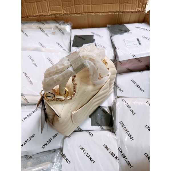 Túi lyn coco màu trắng kem