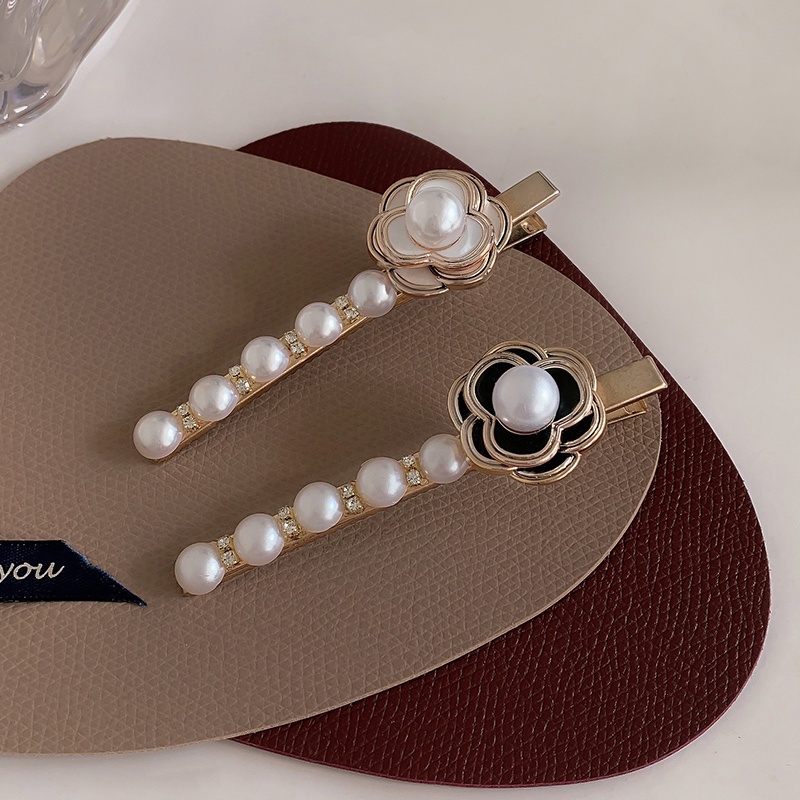 Kẹp tóc một bên đính ngọc trai nhân tạo thời trang 2021