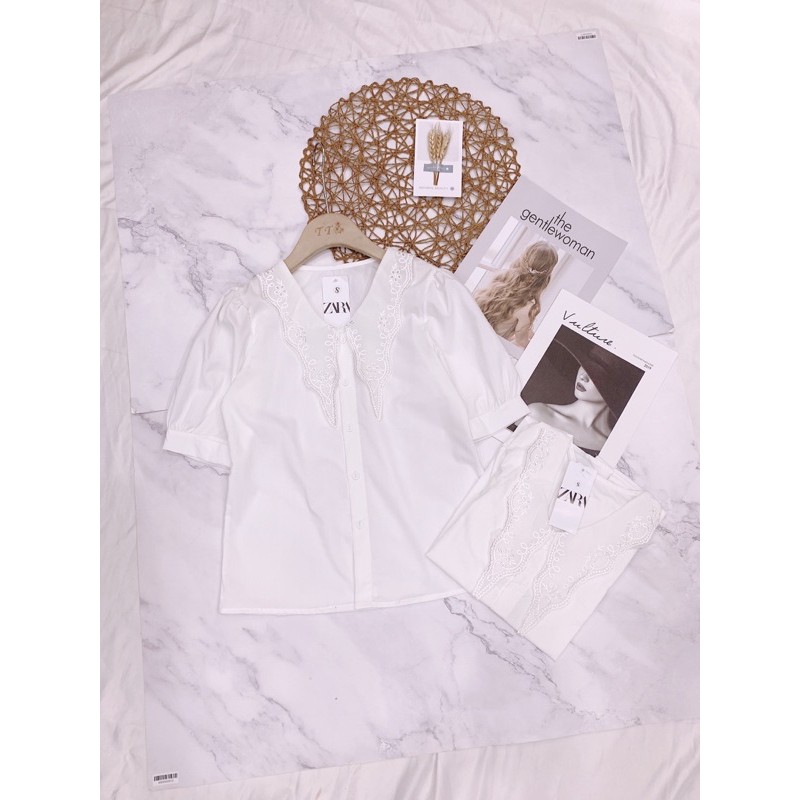 Sơ mi trắng cổ vạt thêu  vnxk