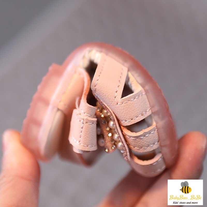 Sandal quai rọ tập đi cho bé gái, dép quai hậu đính nơ có kim sa lấp lánh cho bé từ 0 đến 4 tuổi, 2 màu trắng - hồng a10