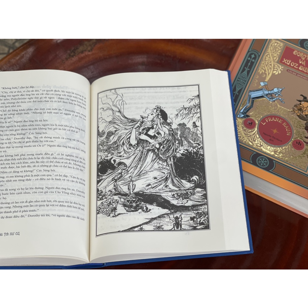 Sách-(Bìa cứng in màu tranh phụ bản) Dorothy và xứ Oz diệu kỳ-L.Frank Baum-Nguyễn Thị Hạnh - Phuc Minh Books-nxb Văn học