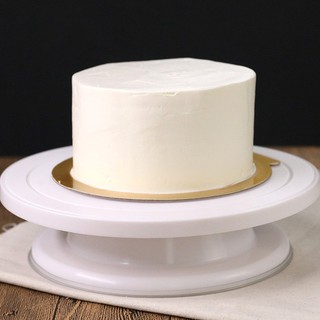 Rotating base holder for cake decoration