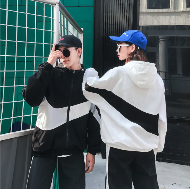 Áo khoác thể thao Nika với thiết kế tương phản đen trắng dành cho nam và nữ | BigBuy360 - bigbuy360.vn