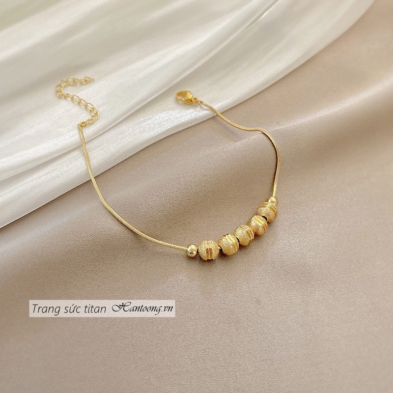 Vòng tay titan nữ không gỉ mạ vàng 18k thiết kế dạng viên bi thời trang thanh lịch 2022 | BigBuy360 - bigbuy360.vn