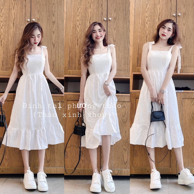 Váy đũi trắng 2 dây xoè dài qua gối Tc