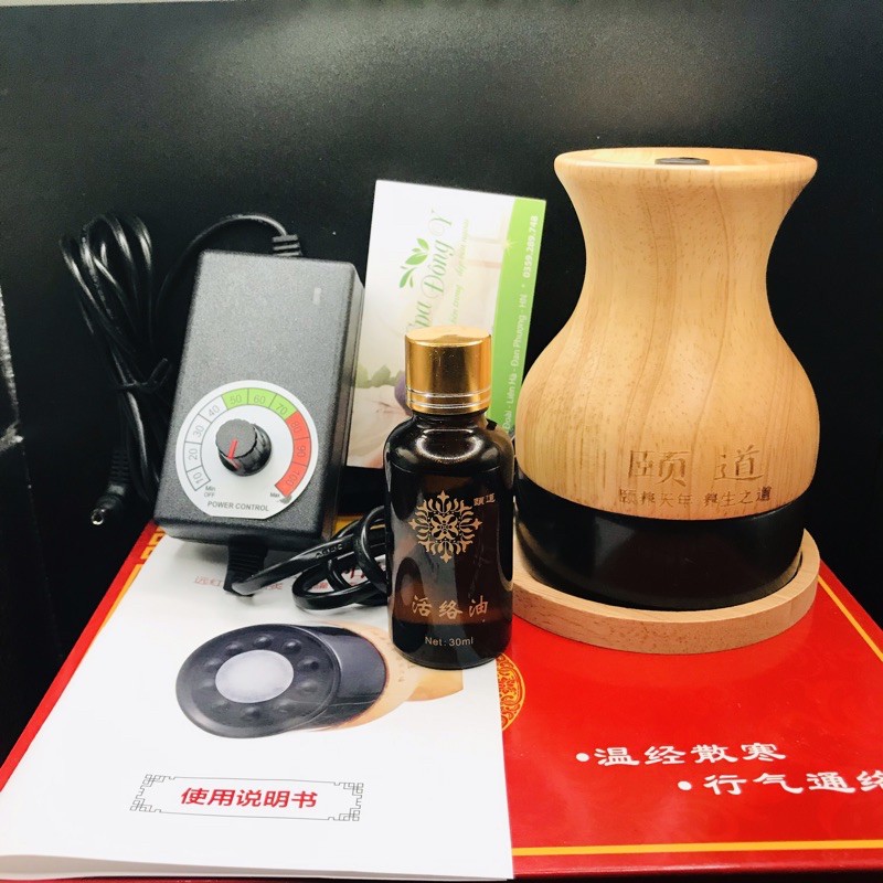 Máy hồng quang loại 1 kèm theo diệu 30ml và dầu masssage gừng 230ml ấm nóng sâu