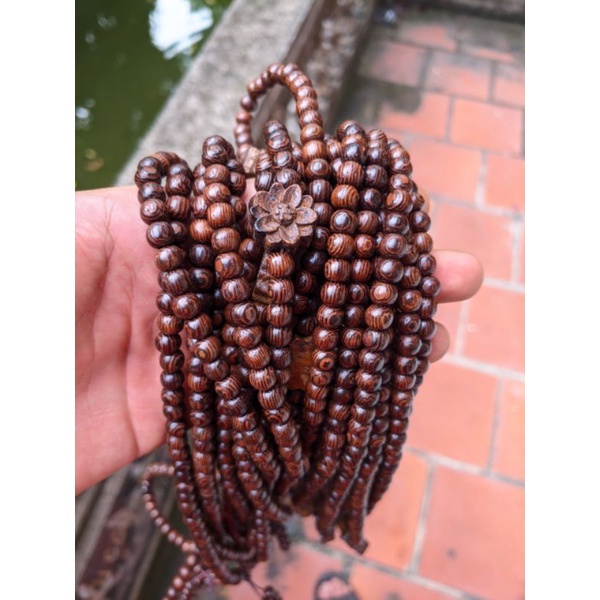 chuỗi hạt 108 cỡ hạt 6ly gỗ vân mun đuôi công vòng tay nữ mix charm hoa sen