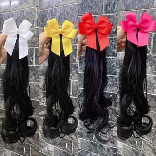 Kẹp tóc nơ xoăn dài cho bé