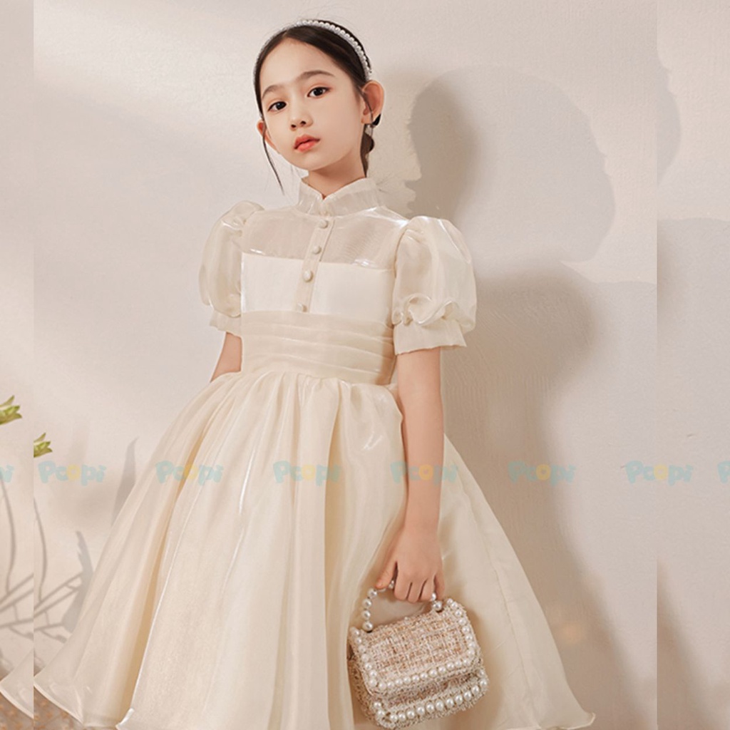 Đầm Công Chúa Cho Bé Poopi Dáng Xòe Màu Be Sữa Đính Nơ Lưng, Váy Cho Bé Gái Dự Tiệc Xinh Đẹp