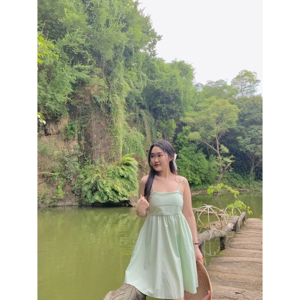 Đầm babydoll màu xanh ngọc hai dây phối nơ xinh xắn