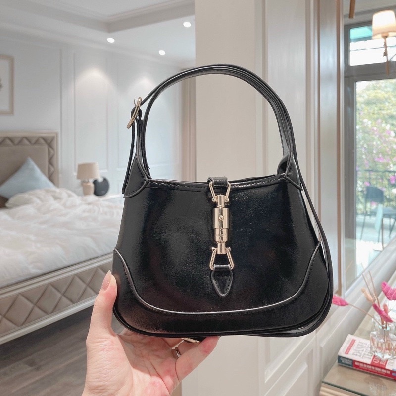 Túi cầm tay gc jackie