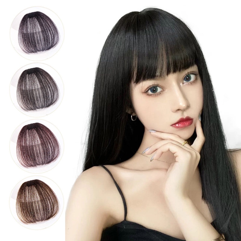 Tóc mái giả làm bằng sợi tơ mềm mượt.