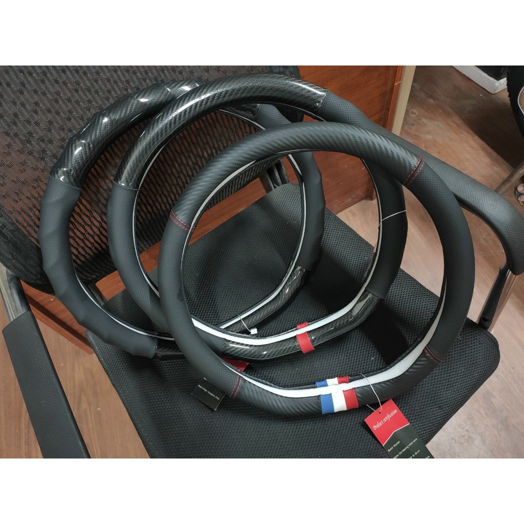 Bọc vô lăng Cao Cấp D-Cut Cho Xe SUZUKI XL7,ERTIGA,SWIFT,KIA SELTOS, SONET,ELANTRA SPORT,NISSAN ALMERA, BEJING, MG ZS