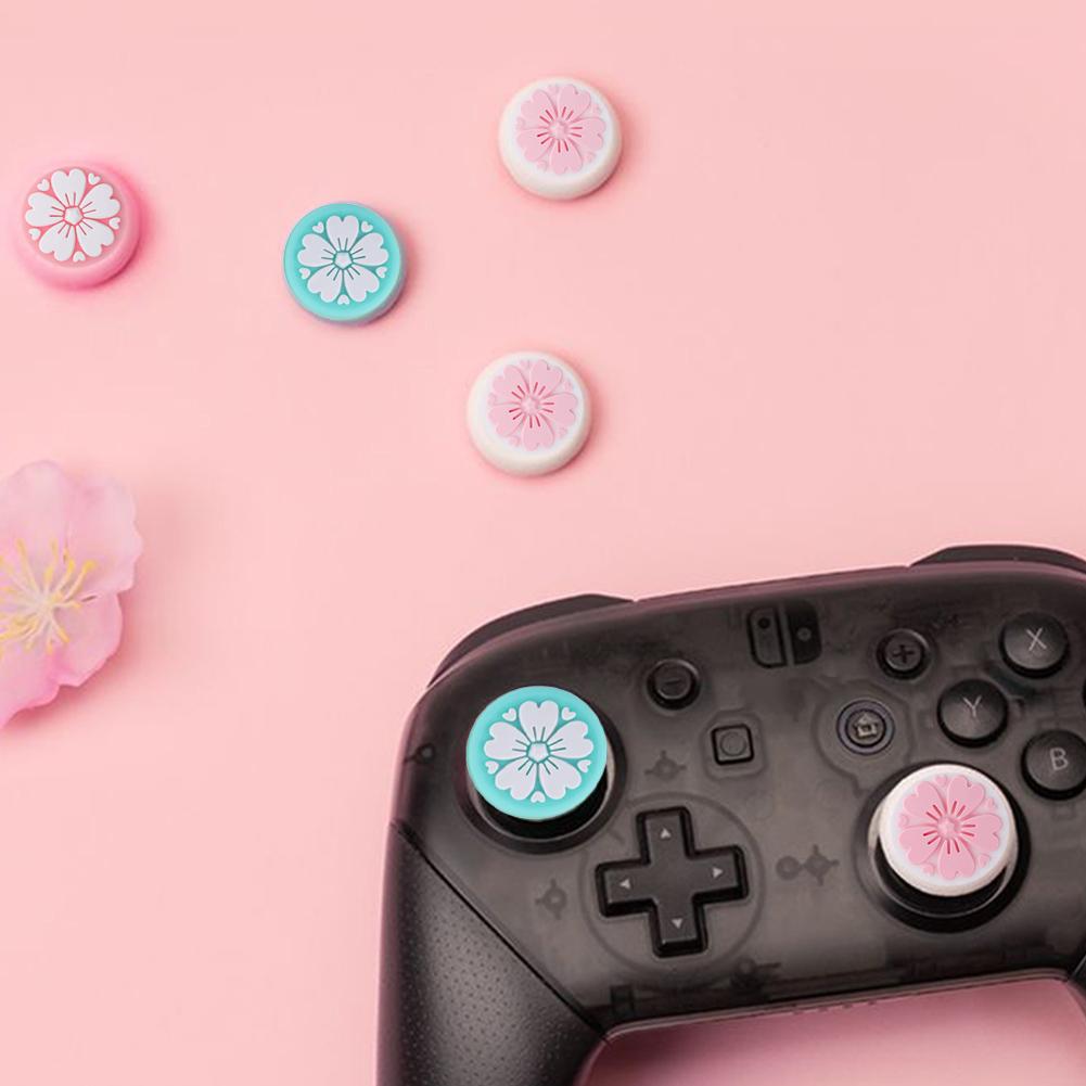 4PCS Sweet Sakura Flower Thumb Grip Caps ,Joystick Cap for Nintendo Switch & Lite Silicone Caps Cover for Nintendo Switch