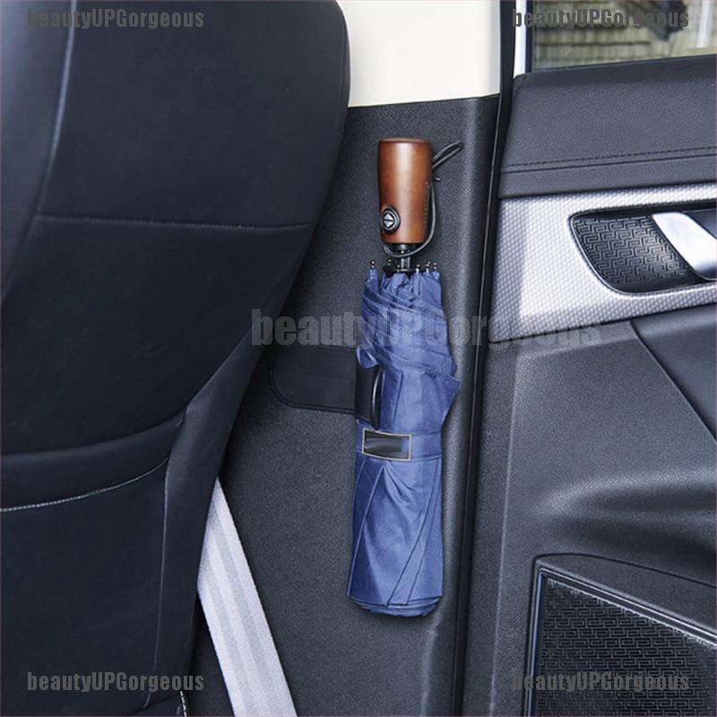 Giá đỡ móc treo dù gắn xe hơi đa năng tiện dụng