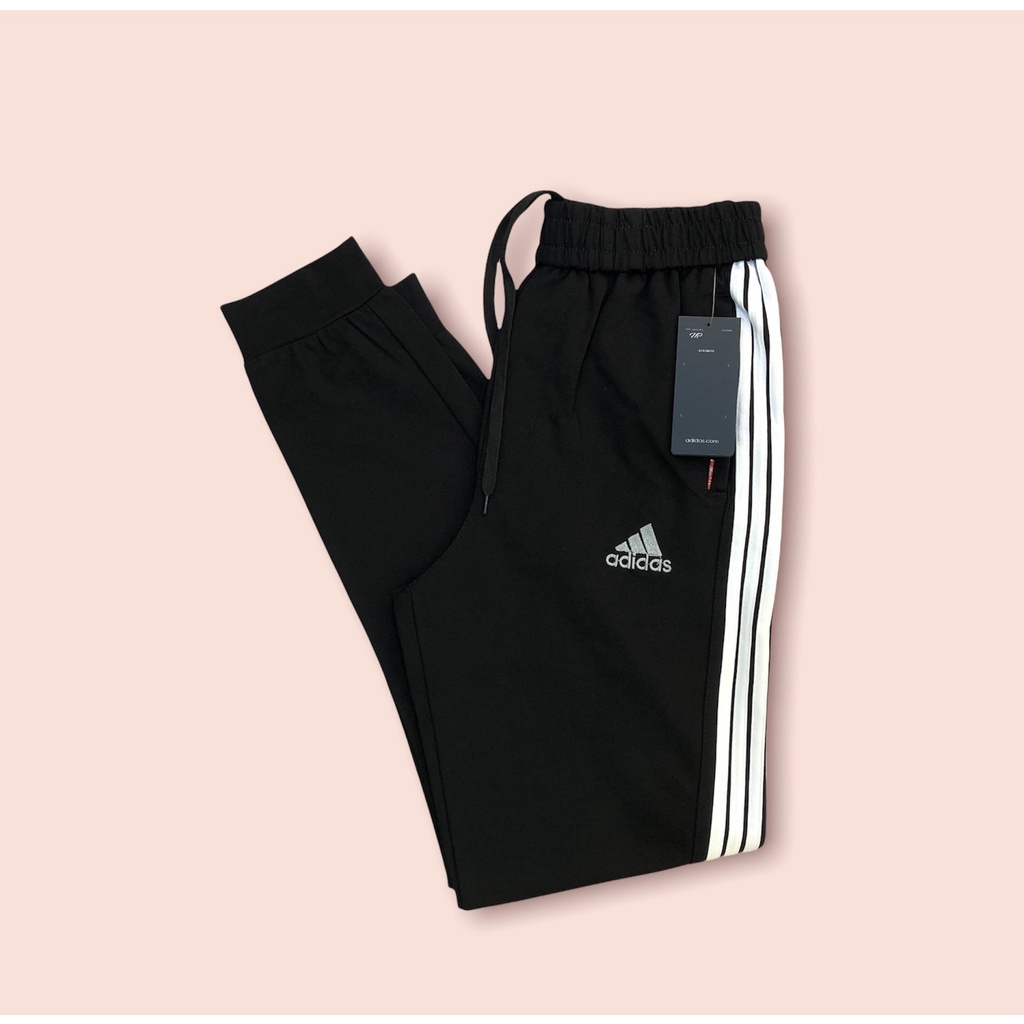 Quần jogger thể thao nam nữ ống bó thu đông hot 2021 chất UMI co dãn