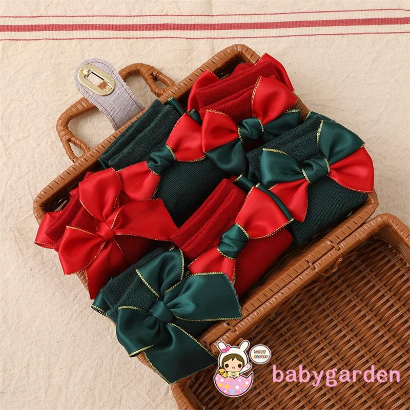 Set 2 đôi vớ dài trung bình đính nơ họa tiết Giáng Sinh dành cho bé gái 0-4 tuổi