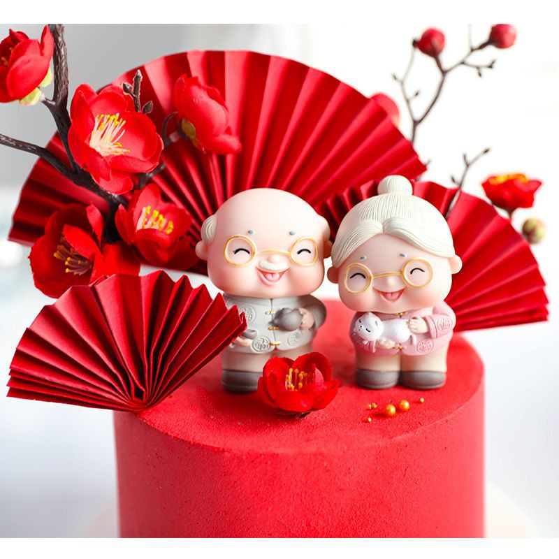 Tượng trang trí bánh kem  Tượng ông bà bế mèo - tượng ông bà