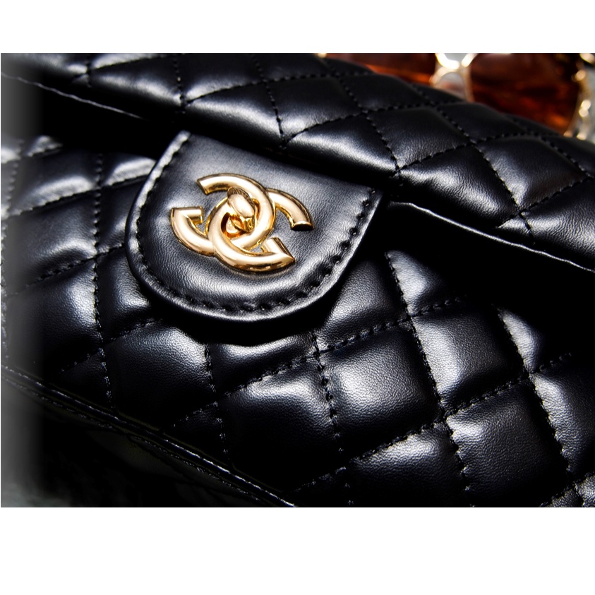 Túi đeo chéo màu đen khóa X chất da bóng siêu êm mềm