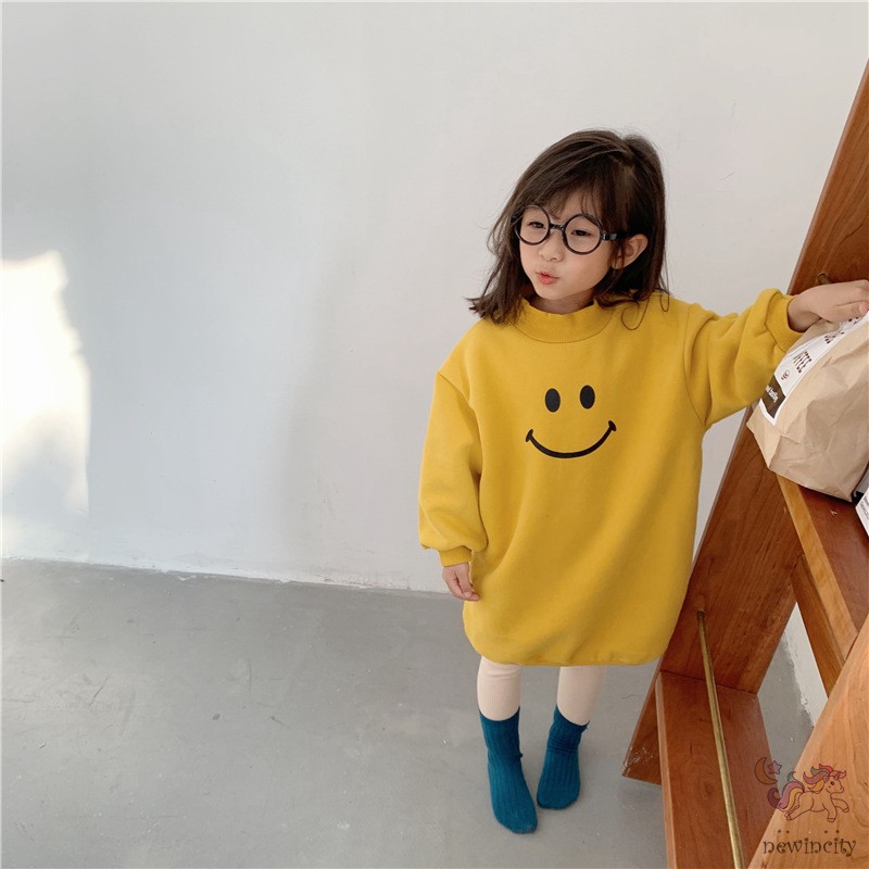 Đầm Thun Dài Tay In Họa Tiết Mặt Cười Cho Bé