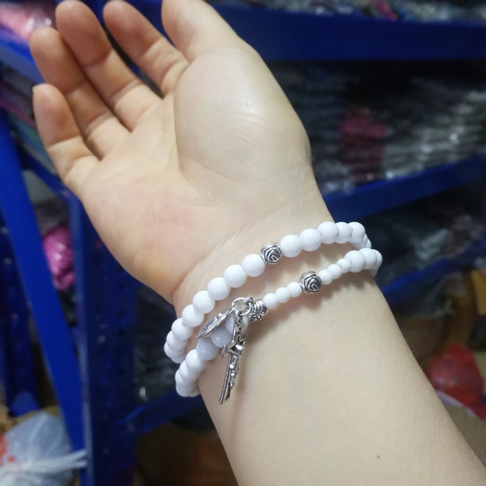 Vòng Tay Chuỗi Hạt Trắng Đính Mặt Thánh Giá