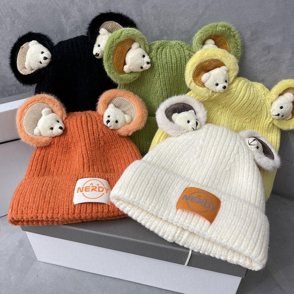 Mũ Len Beanie Đính Búp Bê Tai Dài Dễ Thương Cho Nữ