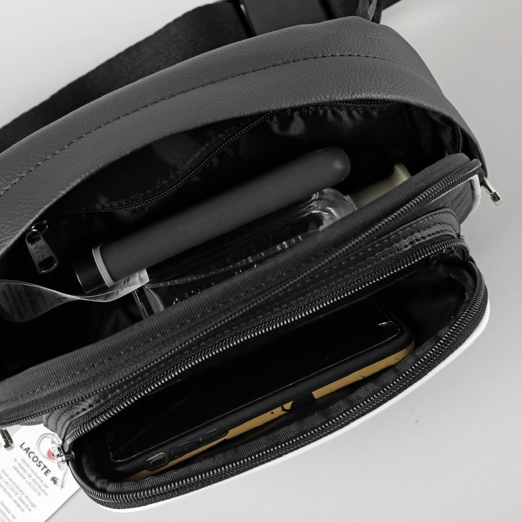 TÚI ĐEO CHÉO LACOSTE  WAISTBAG MINI-  Chất liệu si cty chống thấm,Logo thêu cực kì nét  • Ngăn chính đựng thoải mái