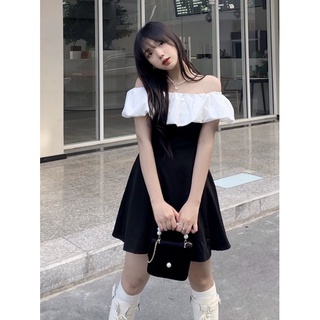 Đầm đen bèo trắng Xavia