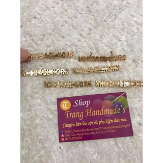 Mác trang trí chữ M.K