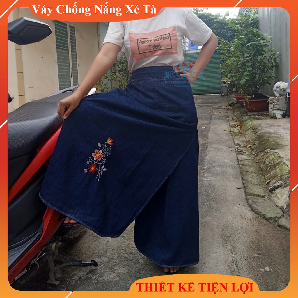 Váy Chống Nắng Jean Cao Cấp Loại Xẻ Tà Chất Liệu Cotton Dày Dặn, Mềm Mại Và Có Nút Bấm Chắc Chắn Thêu Hoa Anh Đào