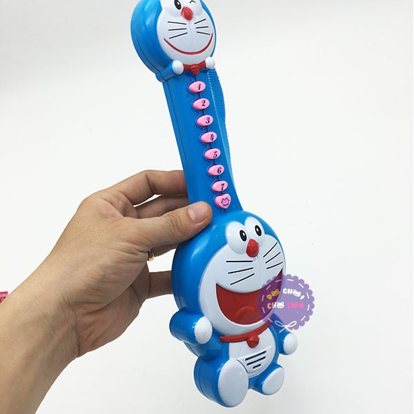 Đồ chơi đàn guitar Doraemon dùng pin có nhạc tiếng Việt