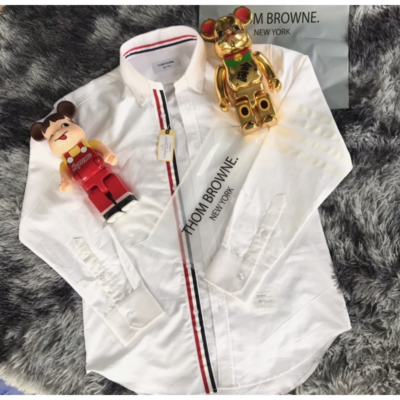 Sơ mi thom brown Trắng viền 4 sọc trắng