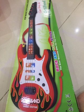 Đàn ghi ta cho bé