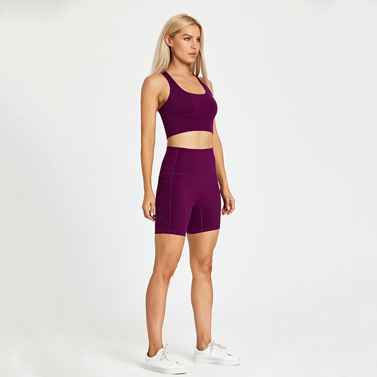 Bộ đồ thể thao Hoppe Fumeng gồm áo lót nâng ngực và quần short có túi cho nữ
