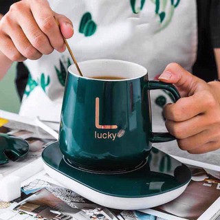 Bộ cốc ly sứ hâm nóng Lucky thông minh cao cấp,kèm đế điện hâm cafe,sữa,trà .Tặng kèm 1cthiaf mạ vàng siêu tiện lợi
