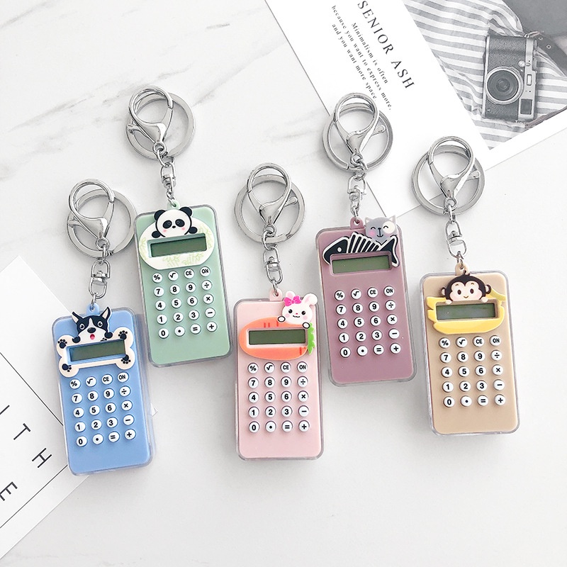 Máy Tính Xách Tay Mini Kèm Móc Khóa Hoạt Hình Dễ Thương