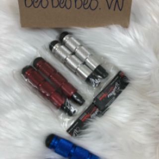 Gù chống đỗ xe máy
