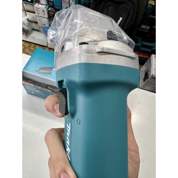 Máy mài góc cầm tay bằng điện Makita 9558HN