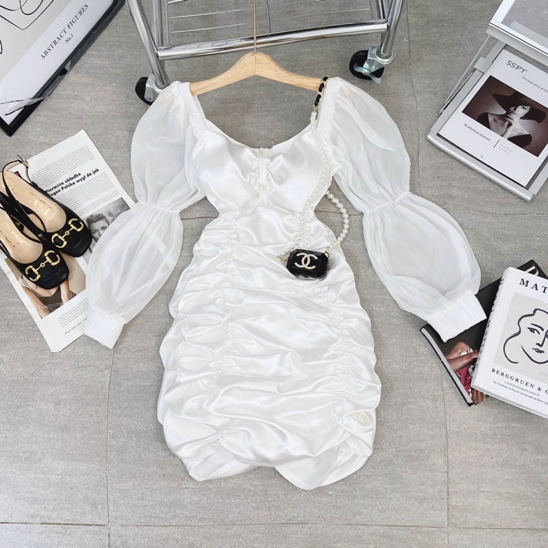 ĐẦM BODY TRẮNG CUT OUT NGỰC NHÚN TAY KHÚC PHỒNG