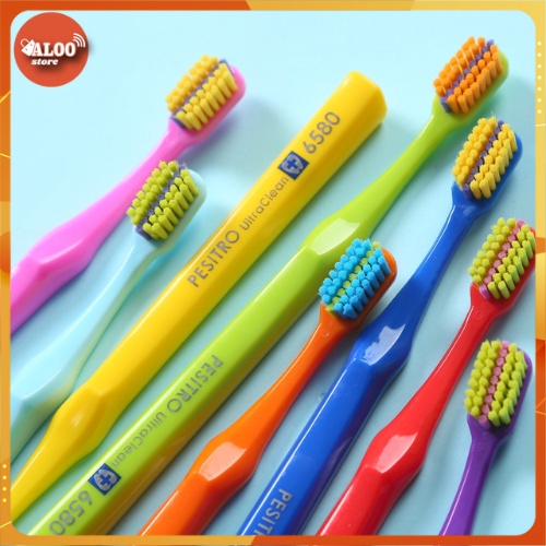 Bàn chải răng niềng Pesitro 6580 ultra soft ortho có rãnh giữa