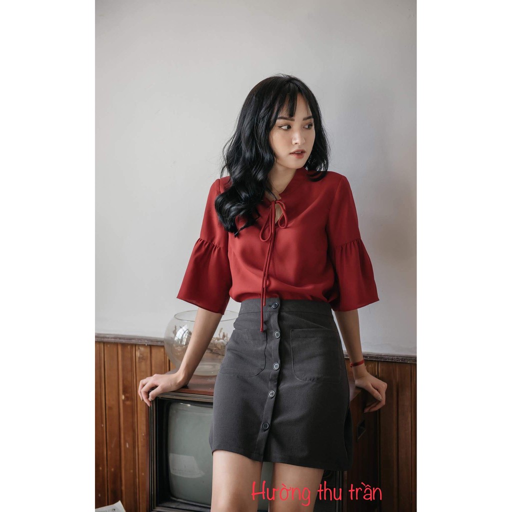 chân váy chữ a phối cúc thời trang công sở