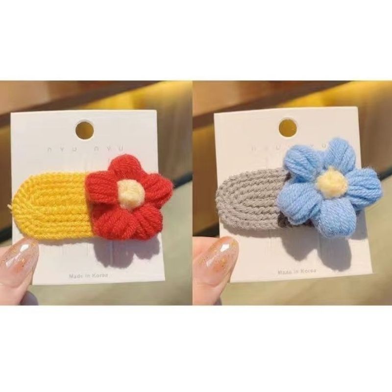 Kẹp tóc len hình bông hoa