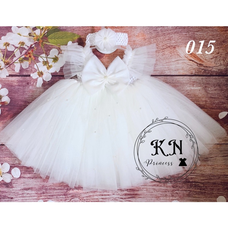 Đầm công chúa cánh tiên màu trắng nơ MS015. Đủ size cho bé từ 1 tháng-8 tuổi , tặng kèm băng đô hoặc bờm tóc cho bé