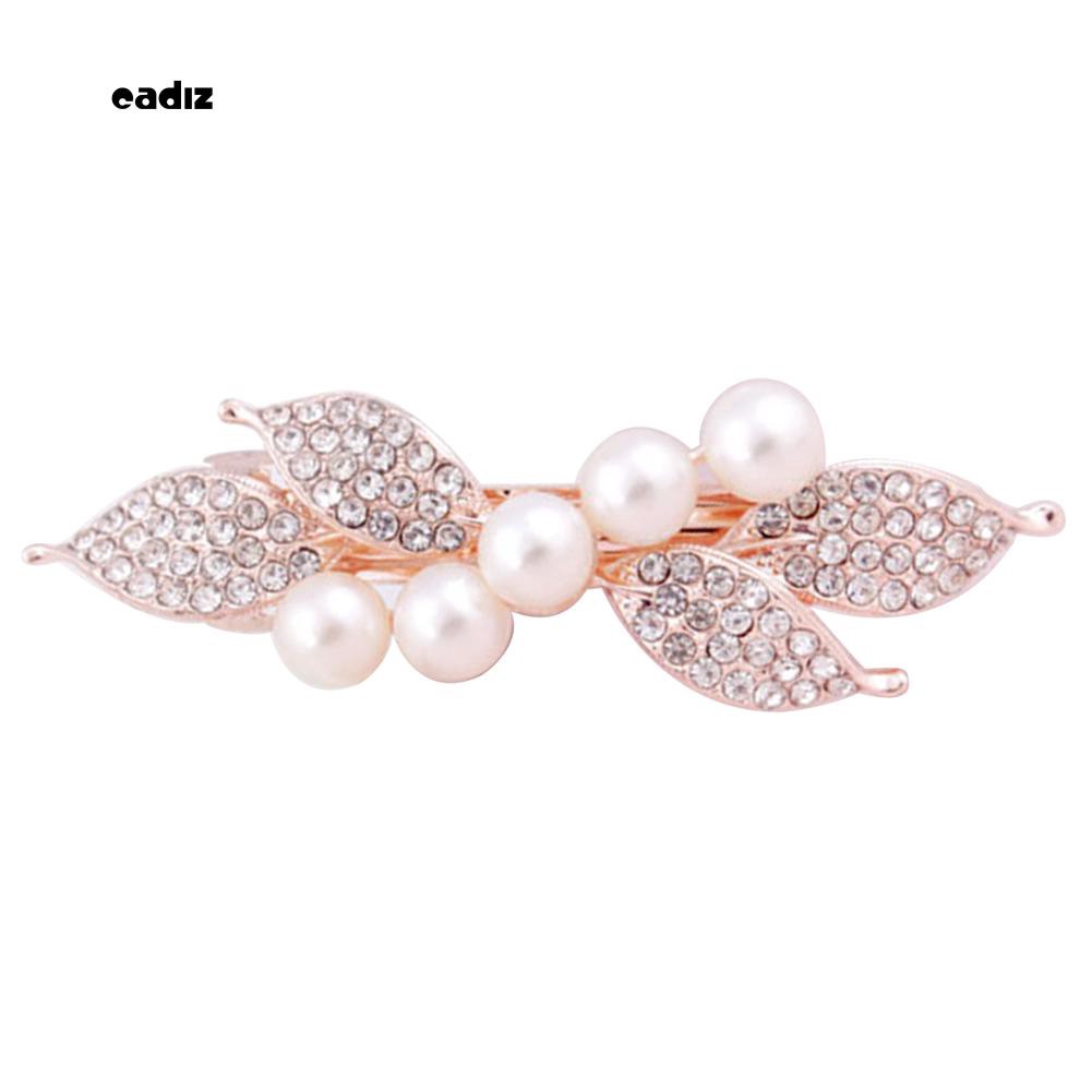 Kẹp tóc nơ đính hạt giả ngọc trai