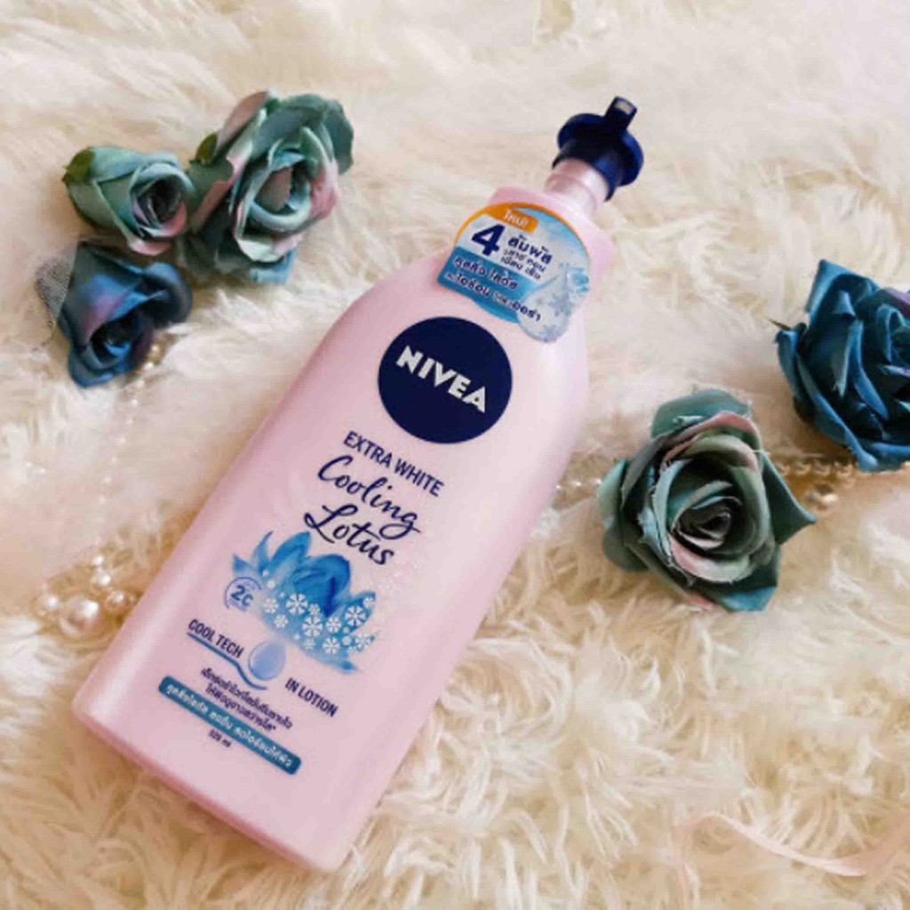 Sữa Dưỡng thể Nivea Extra White Lotion Cooling Lotus 525ml chống nắng dưỡng ẩm trắng da và mát da - Thái Lan