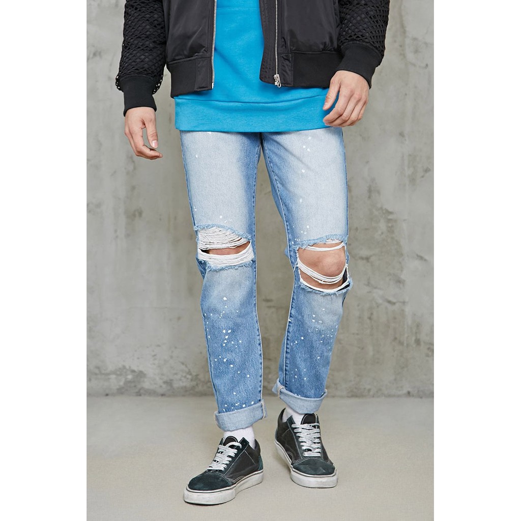 Quần jeans rách gối vẩy sơn