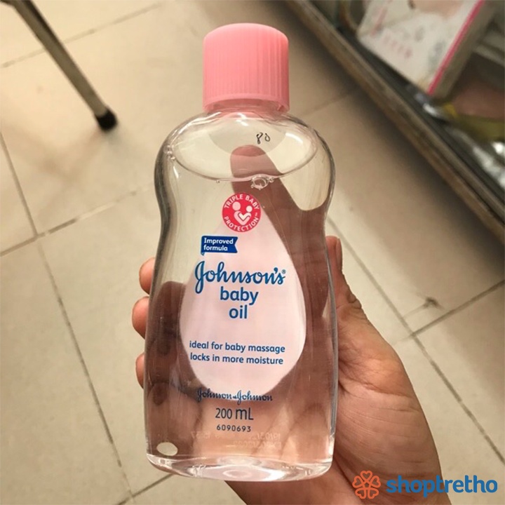 Dầu massage và dưỡng ẩm oil Johnson's baby 200ml