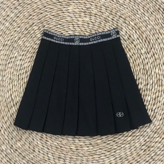 CHÂN VÁY XẾP LY CẠP GUCI