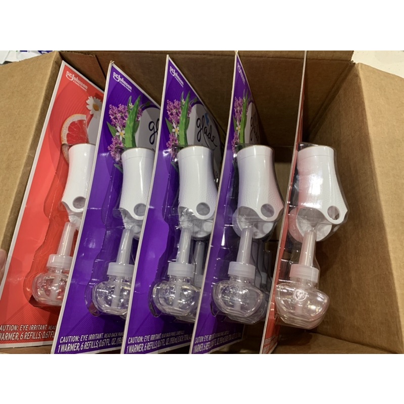 Bộ tinh dầu thơm cắm điện Glade Cashmere Woods & Clean Linen Scented Oil 1 Warmer + 6 Refills